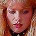 see barbara crampton in from beyond ( also known as h.p. lovecraft's from beyond also known as from beyond : aux portes de l'au-delà ): a strange machine awakens the sexual urges of a pretty blonde a strange machine awakens the sexual urges of a pretty blonde