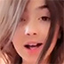 a young brunette masturbates with a toothbrush